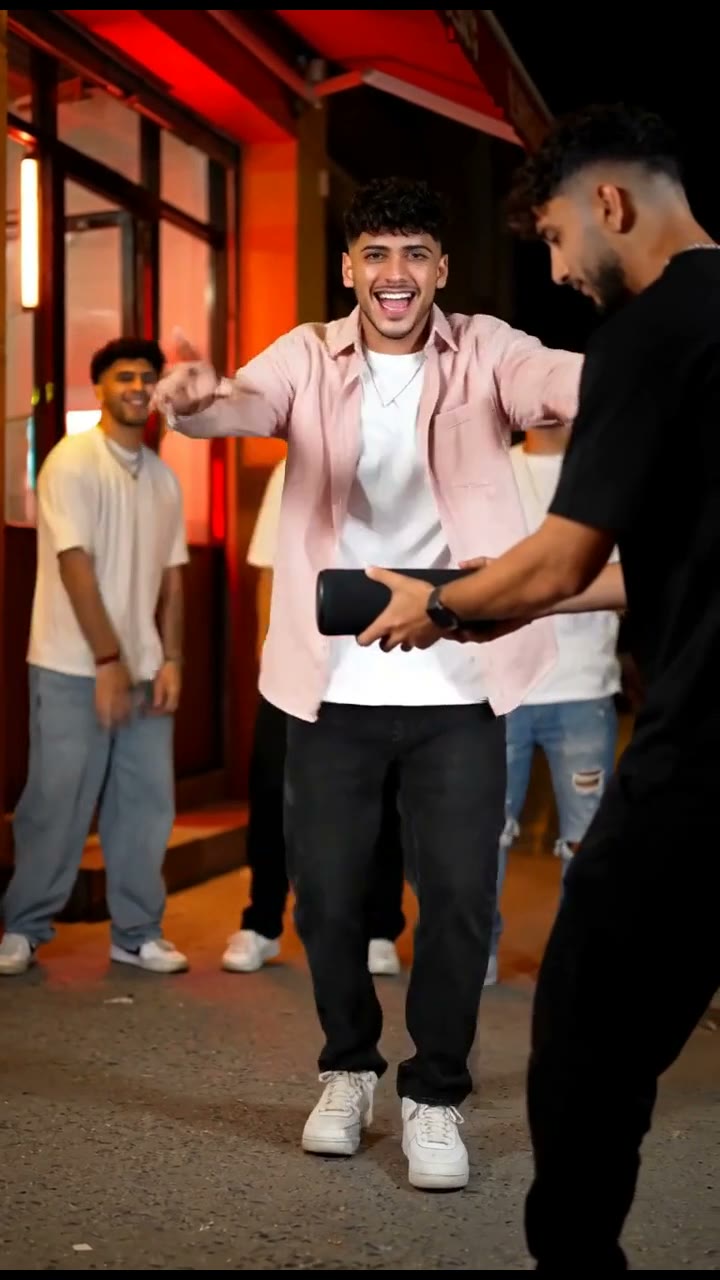 Frame from the original MiniMax H3 street freestyle with a fictional lead and portable speaker